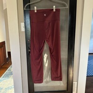 Wine color LuluLemon 23” Wonder Under High rise size 6